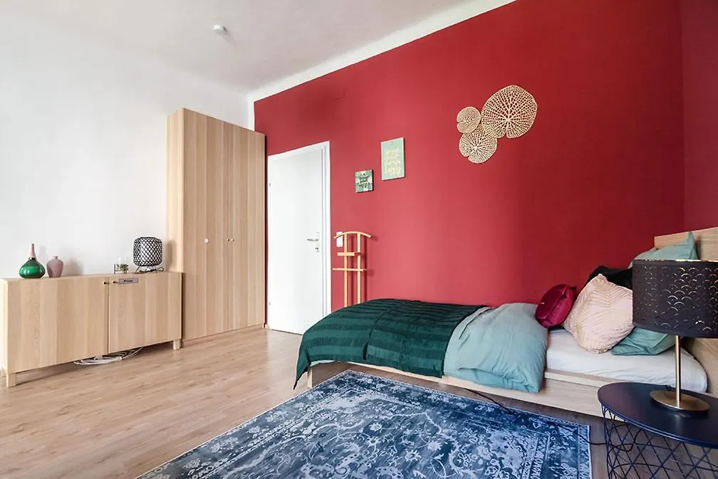 Colorful Apartment Facing Green Courtyard contacts
